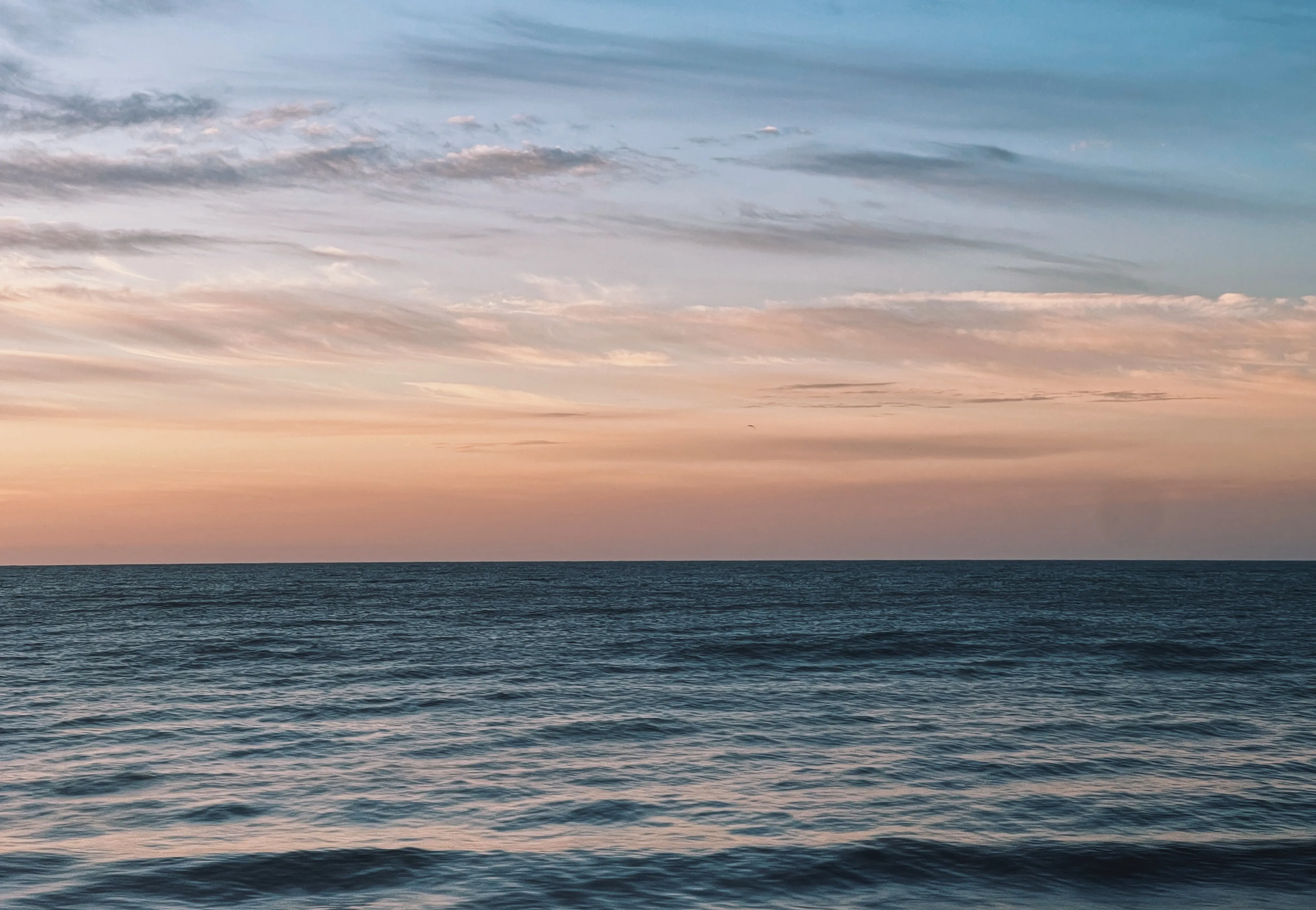 Early morning sea in late August, tide still rising, cool morning light