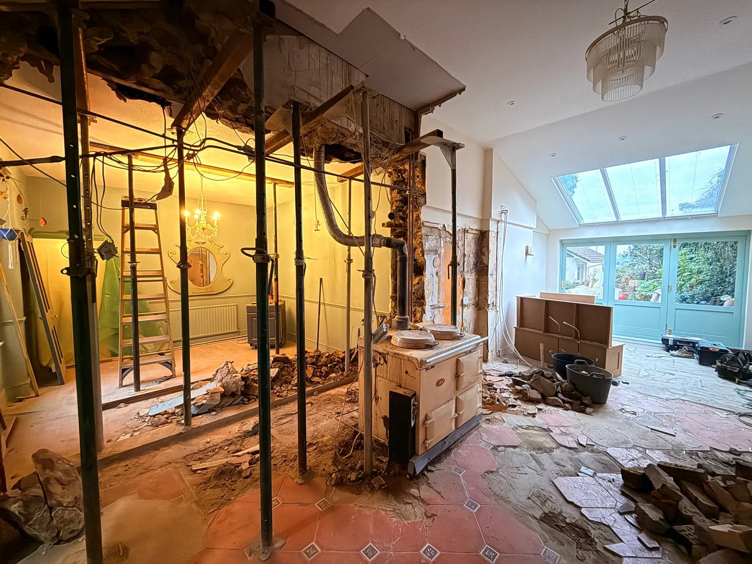 The rest of the wall is now out in between what was the kitchen and dining room and the si — photo 1 of 2.
