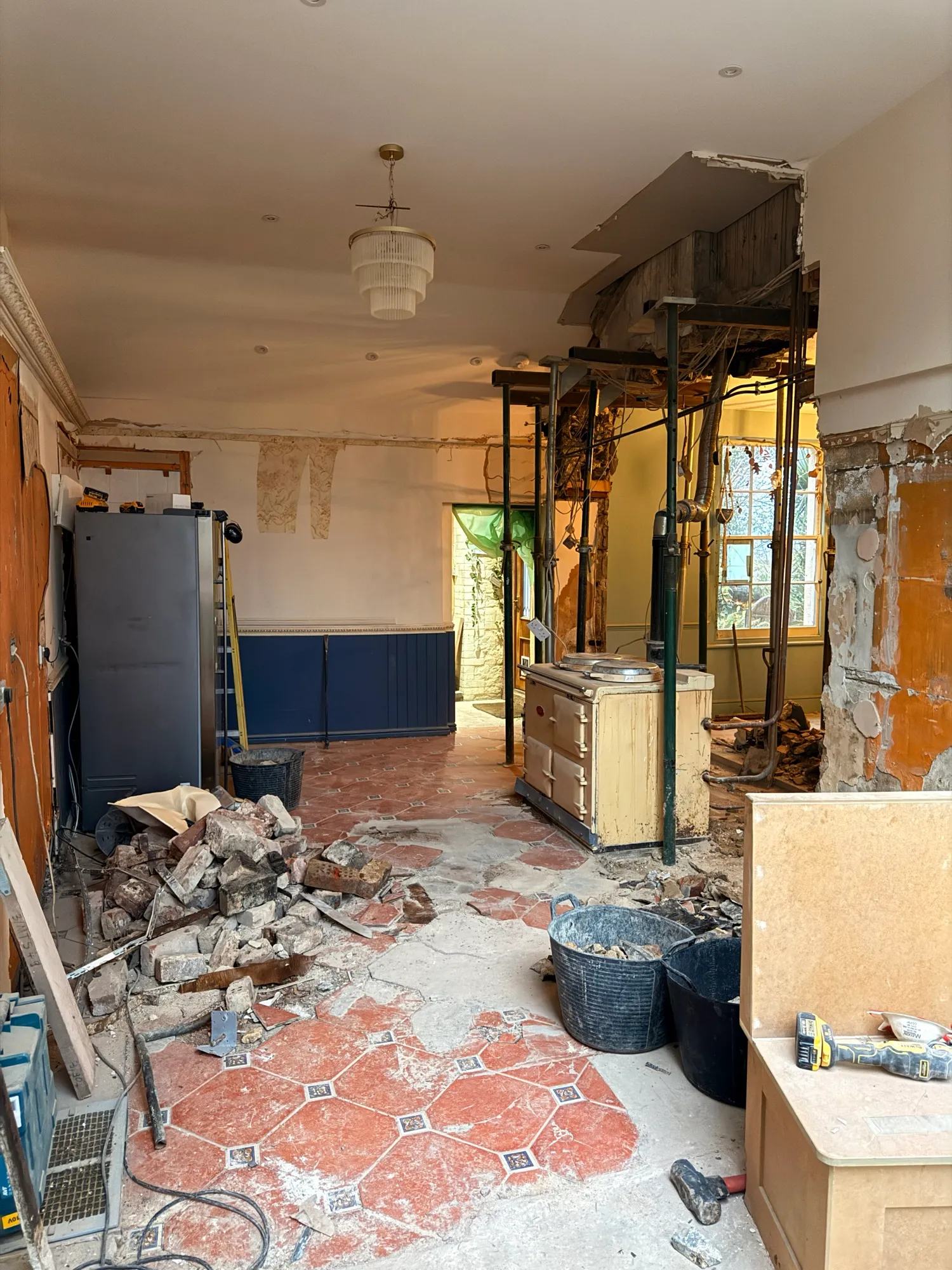 The rest of the wall is now out in between what was the kitchen and dining room and the si — photo 2 of 2.