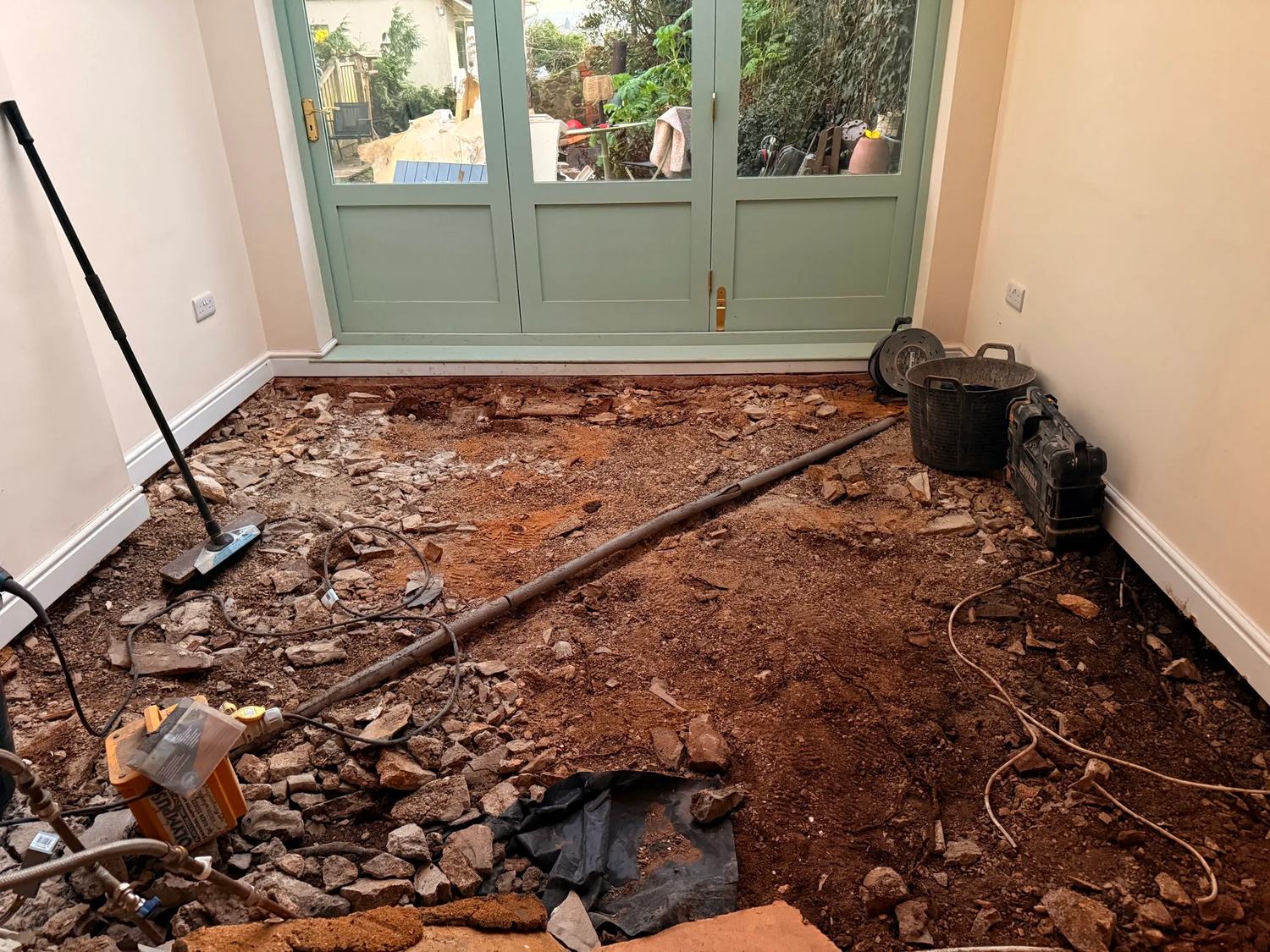 Floors started coming up today — photo 2 of 3.