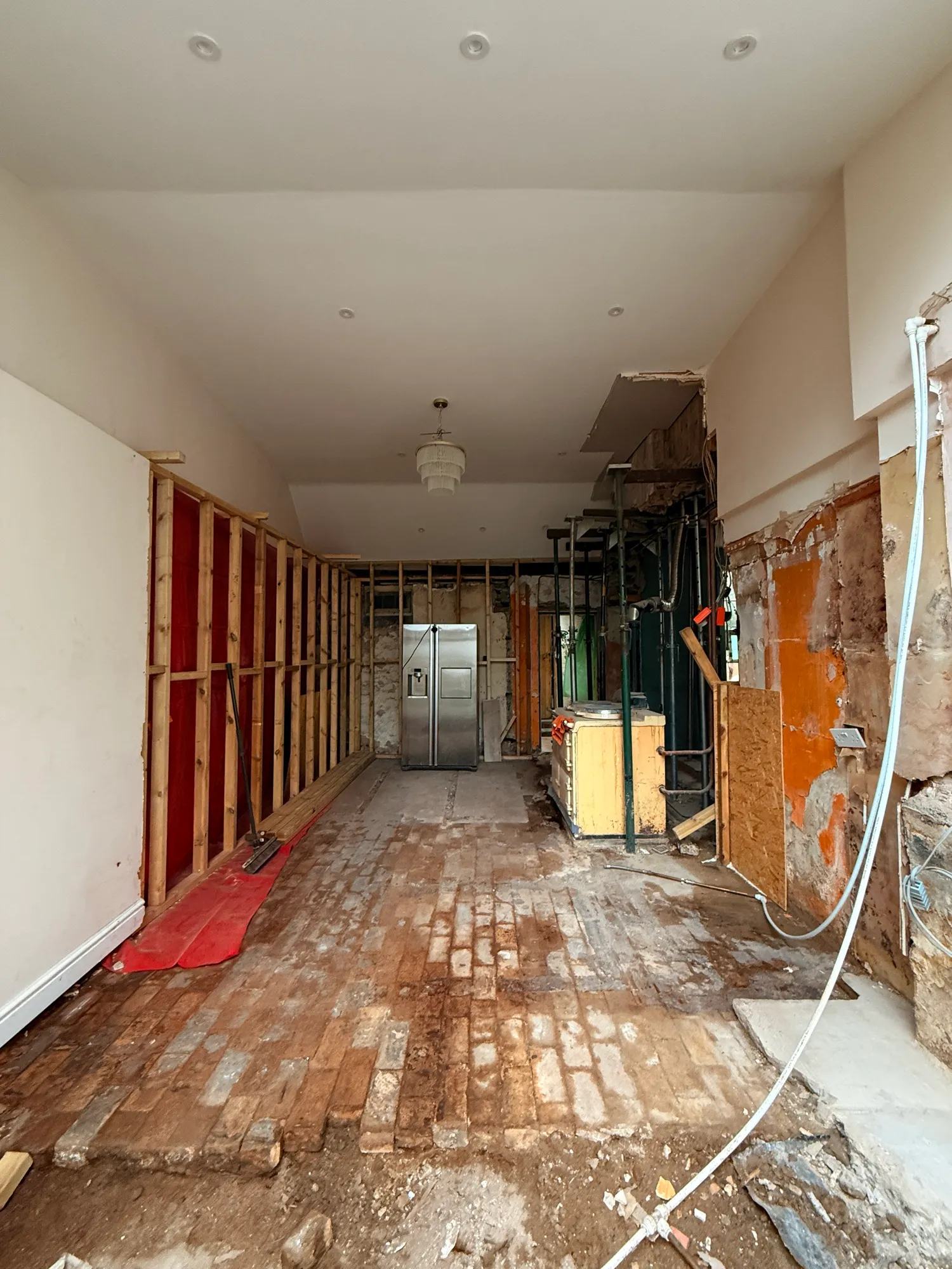 End of week 2 and the floors are now cleared in the main area of the space to the point wh — photo 2 of 4.