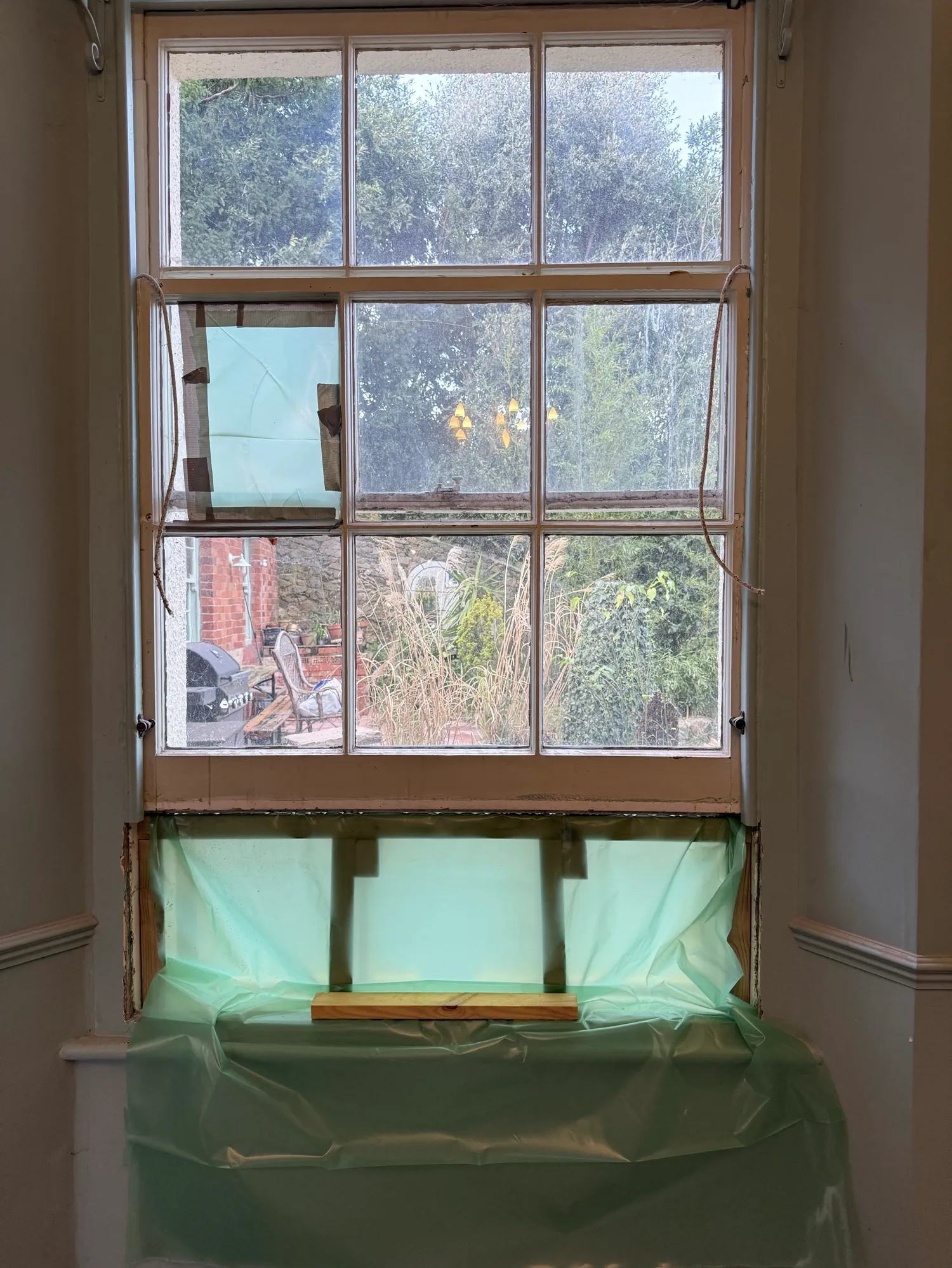 The window out to the back garden is being replaced with a shorter one so that the kitchen.