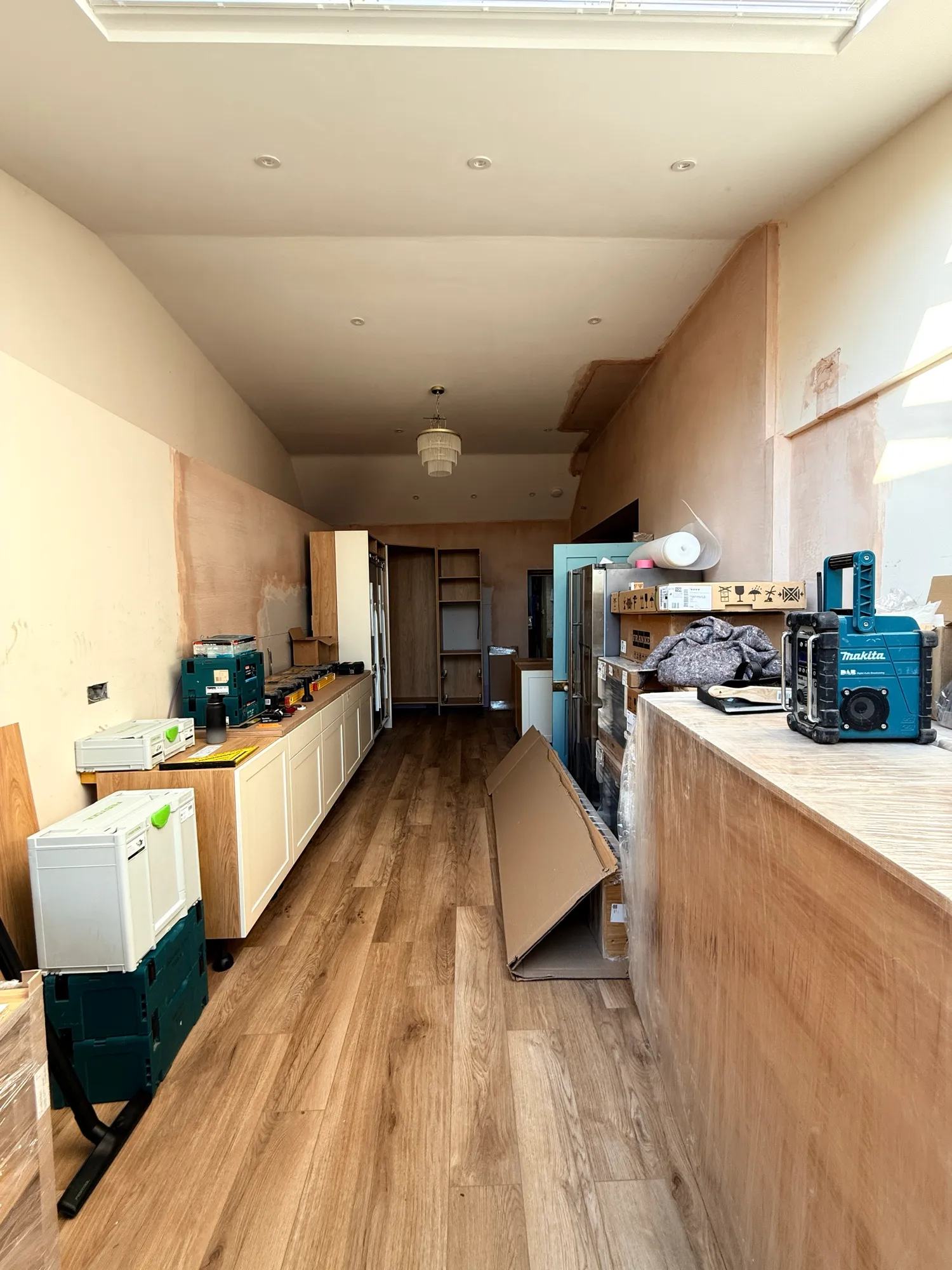Looking from the conservatory end at that same run of cabinets