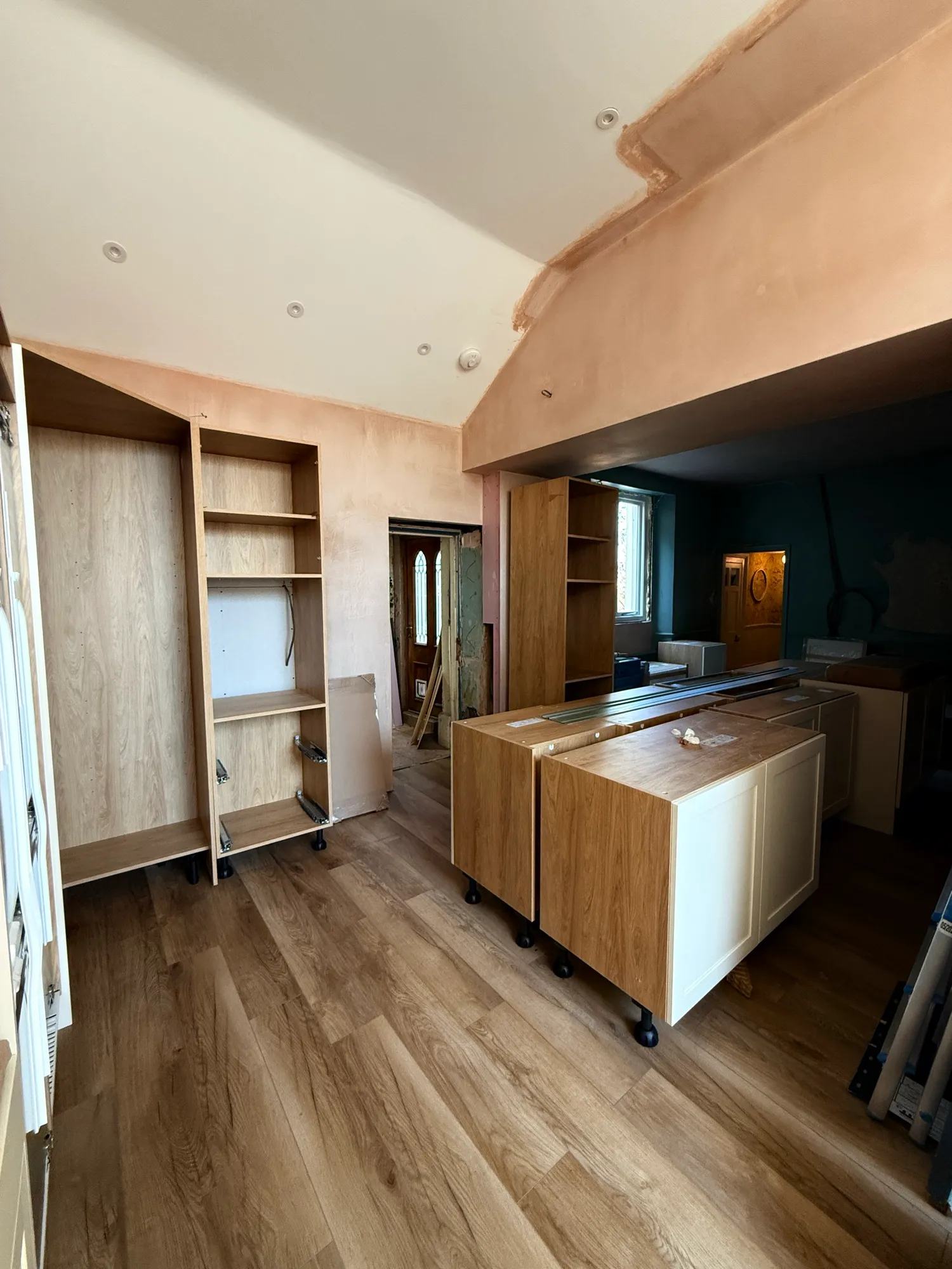 Looking back towards the island from the bar cabinets.