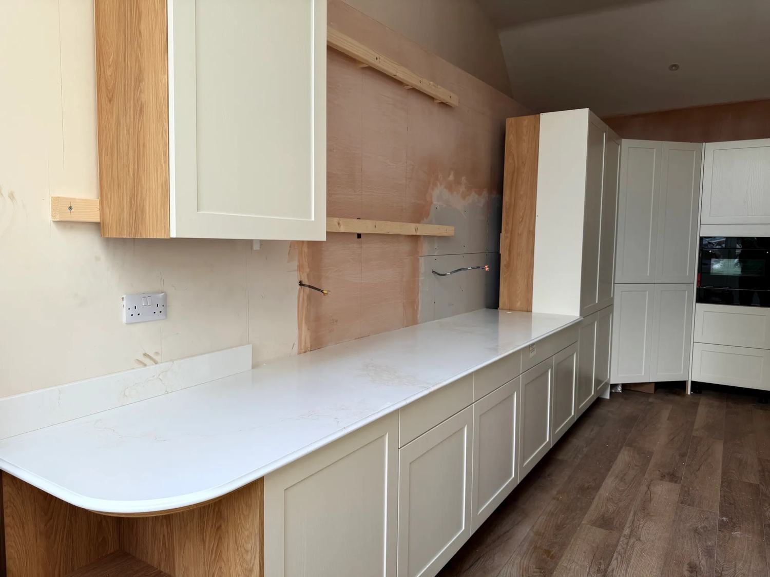 The bad cabinet area where the top cabinets can now be installed on top of the counter.